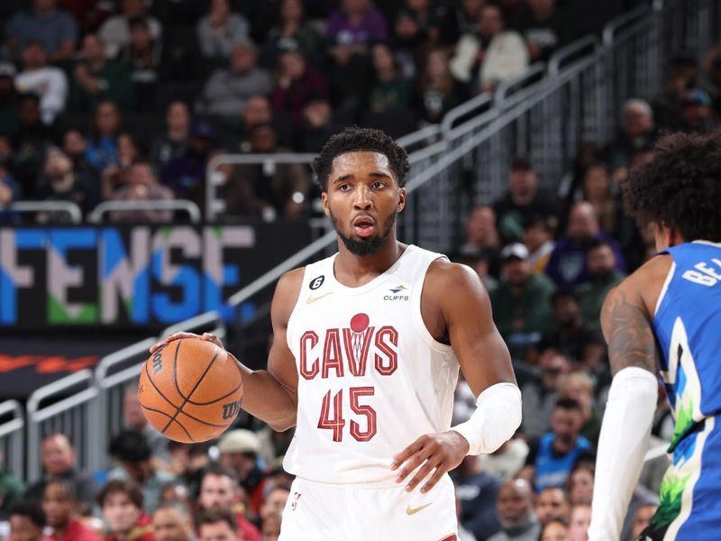 MILWAUKEE, WI - NOVEMBER 16: Donovan Mitchell #45 of the Cleveland Cavaliers dribbles the ball during the game against the Milwaukee Bucks on November 16, 2022 at the Fiserv Forum Center in Milwaukee, Wisconsin. NOTE TO USER: User expressly acknowledges and agrees that, by downloading and or using this Photograph, user is consenting to the terms and conditions of the Getty Images License Agreement. Mandatory Copyright Notice: Copyright 2022 NBAE (Photo by Jeff Haynes/NBAE via Getty Images).