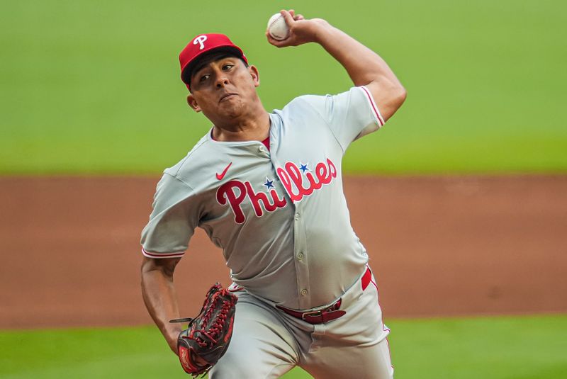 Jul 6, 2024; Cumberland, Georgia, USA; Philadelphia Phillies pitcher Ranger Suarez (55) pitches against the Atlanta Braves during the first inning at Truist Park. Mandatory Credit: Dale Zanine-USA TODAY Sports