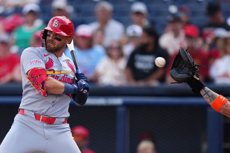 Mar 5, 2025; West Palm Beach, Florida, USA; St. Louis Cardinals outfielder Michael Siani (22) ducks out of the way of a pitch against the Houston Astros during the first inning at CACTI Park of the Palm Beaches. Mandatory Credit: Rich Storry-Imagn Images