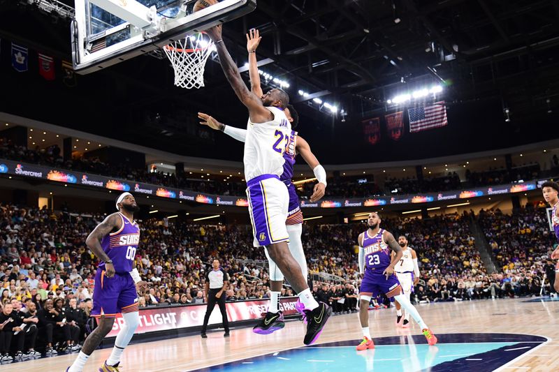 LOS ANGELES, CA - OCTOBER 6: LeBron James #23 of the Los Angeles Lakers drives to the basket during the game against the Phoenix Suns on October 6, 2024 at Acrisure Arena in Palm Springs, California. NOTE TO USER: User expressly acknowledges and agrees that, by downloading and/or using this Photograph, user is consenting to the terms and conditions of the Getty Images License Agreement. Mandatory Copyright Notice: Copyright 2024 NBAE (Photo by Adam Pantozzi/NBAE via Getty Images)