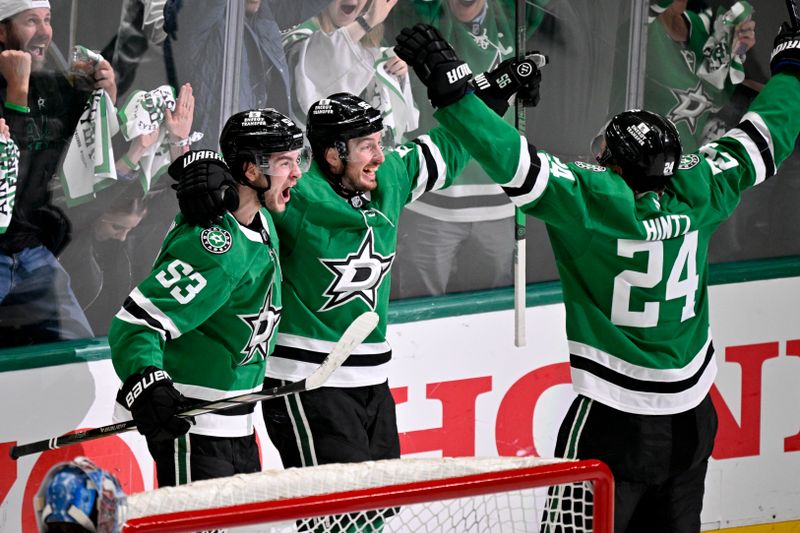 May 3, 2025; Dallas, Texas, USA; Dallas Stars center Wyatt Johnston (53) and center Matt Duchene (95) and center Roope Hintz (24) celebrate Johnston scoring the game winning goal against the Colorado Avalanche during the third period in game seven of the first round of the 2025 Stanley Cup Playoffs at American Airlines Center. Mandatory Credit: Jerome Miron-Imagn Images