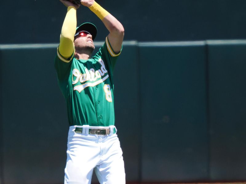 Jun 29, 2023; Oakland, California, USA; Oakland Athletics shortstop Tyler Wade (8) catches the ball against the New York Yankees during the third inning at Oakland-Alameda County Coliseum. Mandatory Credit: Kelley L Cox-USA TODAY Sports