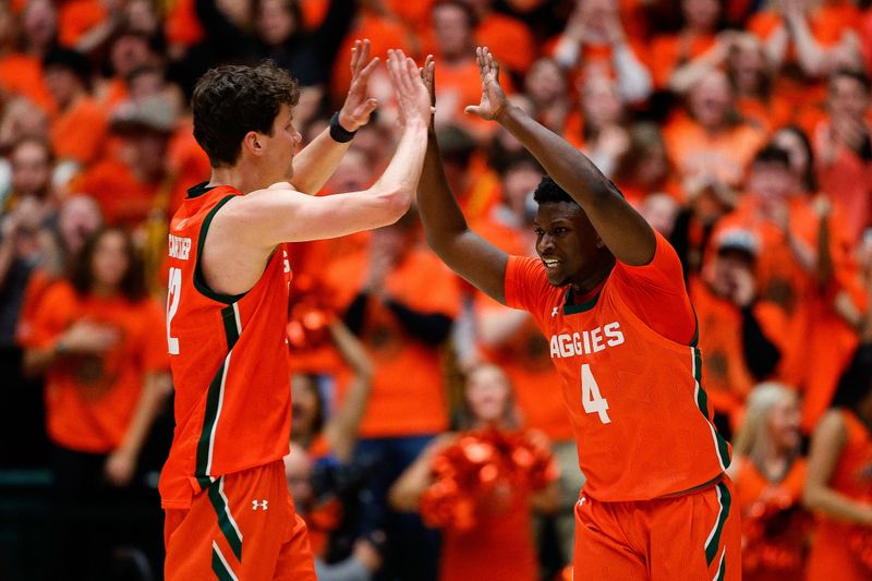 Jan 19, 2024; Fort Collins, Colorado, USA; Colorado State Rams guard Isaiah Stevens (4) reacts with forward Patrick Cartier (12) in the second half against the UNLV Rebels at Moby Arena. Mandatory Credit: Isaiah J. Downing-USA TODAY Sports