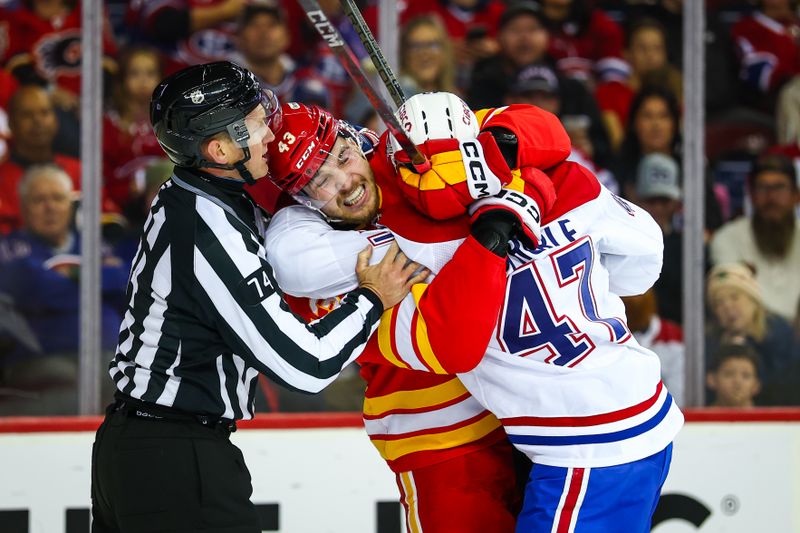 Oct 22, 2025; Calgary, Alberta, CAN; Calgary Flames right wing Adam Klapka (43) and Montreal Canadiens defenseman Jayden Struble (47) gets into a scrum during the second period at Scotiabank Saddledome. Mandatory Credit: Sergei Belski-Imagn Images
