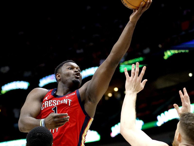 NEW ORLEANS, LOUISIANA - OCTOBER 28: Zion Williamson #1 of the New Orleans Pelicans shoots over Julius Randle #30 of the New York Knicks during the first quarter of an NBA game at Smoothie King Center on October 28, 2023 in New Orleans, Louisiana. NOTE TO USER: User expressly acknowledges and agrees that, by downloading and or using this photograph, User is consenting to the terms and conditions of the Getty Images License Agreement. (Photo by Sean Gardner/Getty Images)