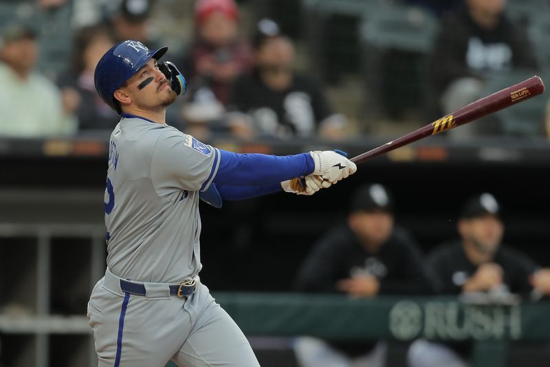 Apr 17, 2024; Chicago, Illinois, USA; Kansas City Royals third baseman Nick Loftin (12) flies out in the fourth inning during game two of a double header against the Chicago White Sox at Guaranteed Rate Field. Mandatory Credit: Melissa Tamez-USA TODAY Sports