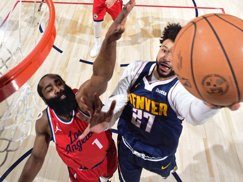 DENVER, CO - APRIL 21:   Jamal Murray #27 of the Denver Nuggets drives to the basket during the game against the LA Clippers during Round 1 Game 2 of the 2025 NBA Playoffs on April 21, 2025 at Ball Arena in Denver, Colorado. NOTE TO USER: User expressly acknowledges and agrees that, by downloading and/or using this Photograph, user is consenting to the terms and conditions of the Getty Images License Agreement. Mandatory Copyright Notice: Copyright 2025 NBAE (Photo by Garrett Ellwood/NBAE via Getty Images)