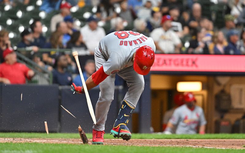 Sep 3, 2024; Milwaukee, Wisconsin, USA; St. Louis Cardinals outfielder Jordan Walker (18) smashes his bat after grounding out against the Milwaukee Brewers in the eighth inning at American Family Field. Mandatory Credit: Michael McLoone-Imagn Images