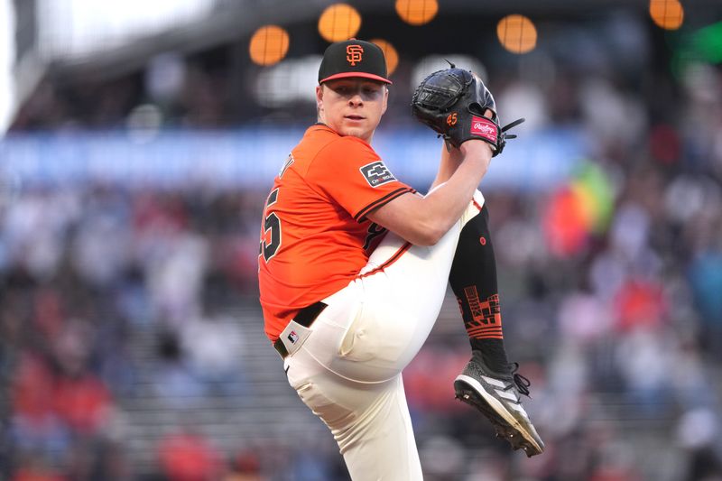 Apr 26, 2024; San Francisco, California, USA; San Francisco Giants starting pitcher Kyle Harrison (45) throws a pitch against the Pittsburgh Pirates during the first inning at Oracle Park. Mandatory Credit: Darren Yamashita-USA TODAY Sports