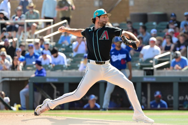 Feb 25, 2026; Salt River Pima-Maricopa, Arizona, USA; Arizona Diamondbacks pitcher Zac Gallen (23) throws in the first inning against the Los Angeles Dodgers at Salt River Fields at Talking Stick. Mandatory Credit: Matt Kartozian-Imagn Images