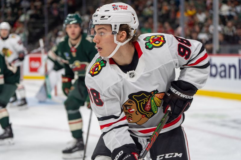 Oct 1, 2024; Saint Paul, Minnesota, USA; Chicago Blackhawks center Connor Bedard (98) skates in the Minnesota Wild zone in the first period at Xcel Energy Center. Mandatory Credit: Matt Blewett-Imagn Images