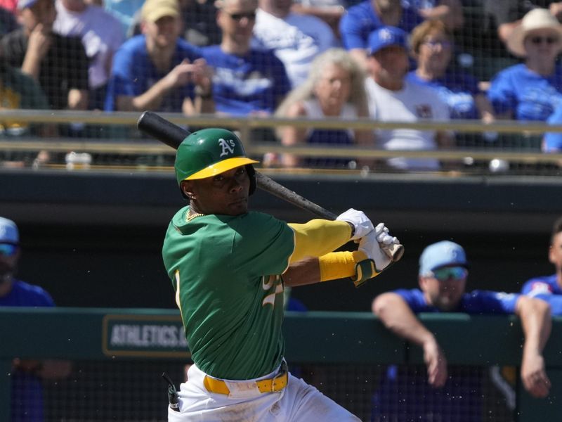 Mar 10, 2024; Mesa, Arizona, USA; Oakland Athletics center fielder Esteury Ruiz (1) hits against the Kansas City Royals in the second inning at Hohokam Stadium. Mandatory Credit: Rick Scuteri-USA TODAY Sports