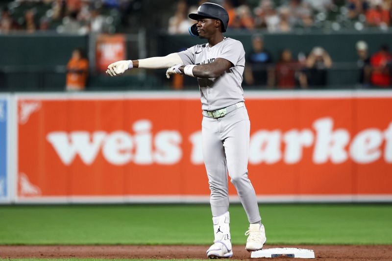 Sep 18, 2025; Baltimore, Maryland, USA; New York Yankees second baseman Jazz Chisholm Jr. (13) celebrates after hitting a double during the sixth inning against the Baltimore Orioles at Oriole Park at Camden Yards. Mandatory Credit: Daniel Kucin Jr.-Imagn Images