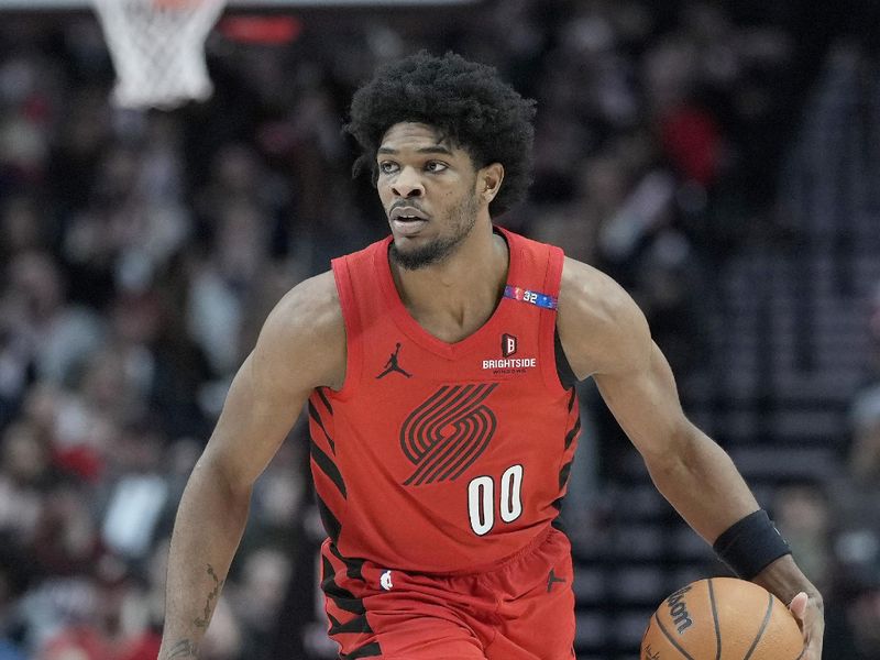 PORTLAND, OREGON - JANUARY 26: Scoot Henderson #00 of the Portland Trail Blazers dribbles the ball during the second half against the Oklahoma City Thunder at Moda Center on January 26, 2025 in Portland, Oregon. NOTE TO USER: User expressly acknowledges and agrees that, by downloading and or using this photograph, User is consenting to the terms and conditions of the Getty Images License Agreement. (Photo by Soobum Im/Getty Images)