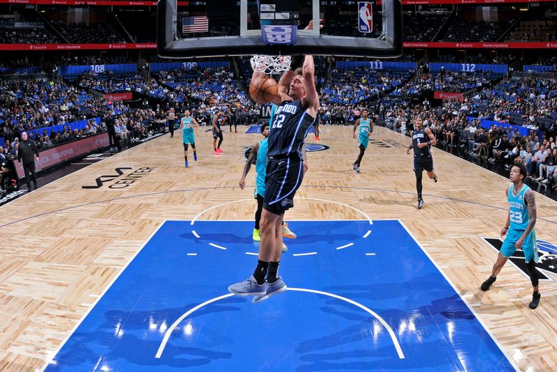 ORLANDO, FL - MARCH 19: Franz Wagner #22 of the Orlando Magic dunks the ball during the game against the Charlotte Hornets on March 19, 2024 at the Kia Center in Orlando, Florida. NOTE TO USER: User expressly acknowledges and agrees that, by downloading and or using this photograph, User is consenting to the terms and conditions of the Getty Images License Agreement. Mandatory Copyright Notice: Copyright 2024 NBAE (Photo by Fernando Medina/NBAE via Getty Images)