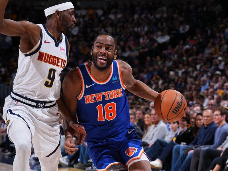 DENVER, CO - MARCH 21: Alec Burks #18 of the New York Knicks drives to the basket during the game against the Denver Nuggets on March 21, 2024 at the Ball Arena in Denver, Colorado. NOTE TO USER: User expressly acknowledges and agrees that, by downloading and/or using this Photograph, user is consenting to the terms and conditions of the Getty Images License Agreement. Mandatory Copyright Notice: Copyright 2024 NBAE (Photo by Garrett Ellwood/NBAE via Getty Images)