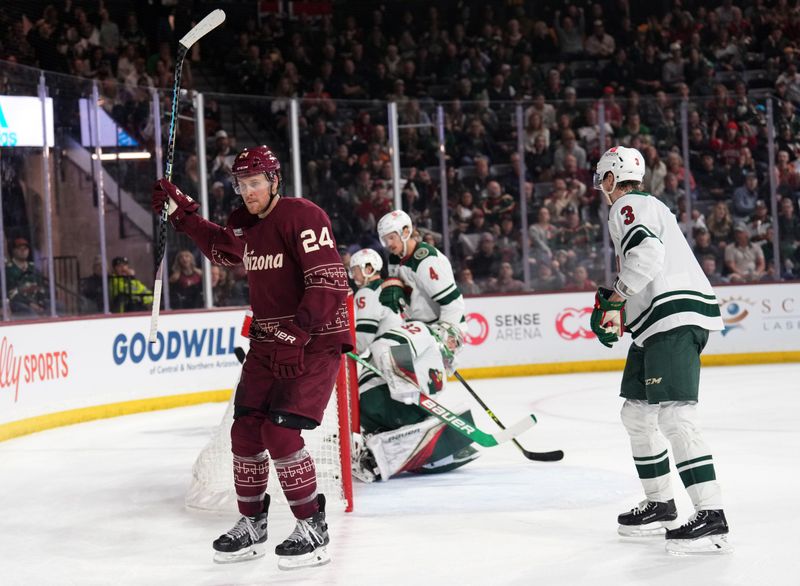 Mar 12, 2023; Tempe, Arizona, USA; Arizona Coyotes right wing Brett Ritchie (24) celebrates his goal against the Minnesota Wild during the second period at Mullett Arena. Mandatory Credit: Joe Camporeale-USA TODAY Sports