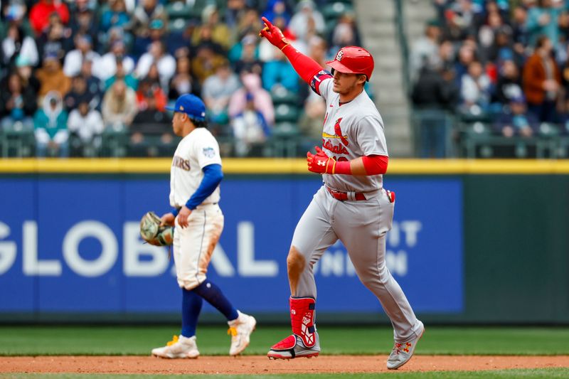 Apr 23, 2023; Seattle, Washington, USA; St. Louis Cardinals second baseman Nolan Gorman (16) runs the bases after hitting a three-run home run against the Seattle Mariners during the fourth inning at T-Mobile Park. Mandatory Credit: Joe Nicholson-USA TODAY Sports