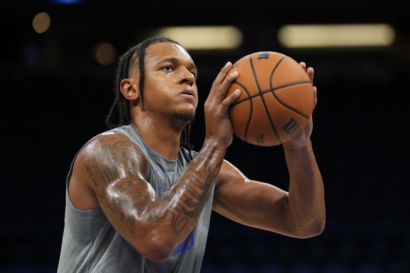 ORLANDO, FLORIDA - NOVEMBER 04: Paolo Banchero #5 of the Orlando Magic warms up prior to a game against the Los Angeles Lakers at Amway Center on November 04, 2023 in Orlando, Florida. NOTE TO USER: User expressly acknowledges and agrees that, by downloading and or using this photograph, User is consenting to the terms and conditions of the Getty Images License Agreement. (Photo by Rich Storry/Getty Images)