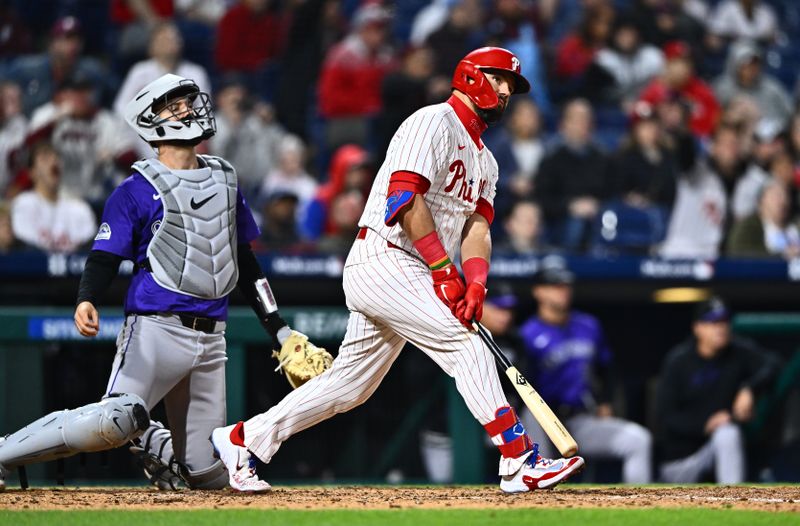 Apr 17, 2024; Philadelphia, Pennsylvania, USA; Philadelphia Phillies designated hitter Kyle Schwarber (12) watches after hitting a two-run home run against the Colorado Rockies in the sixth inning at Citizens Bank Park. Mandatory Credit: Kyle Ross-USA TODAY Sports