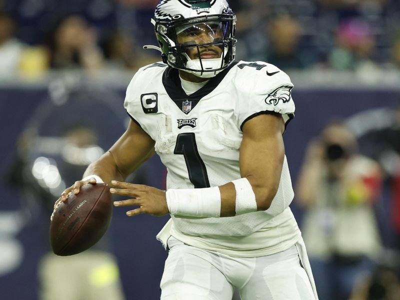 Philadelphia Eagles quarterback Jalen Hurts (1) looks to pass during an NFL Football game against the Houston Texans on Thursday, November 3, 2022, in Houston. (AP Photo/Matt Patterson)