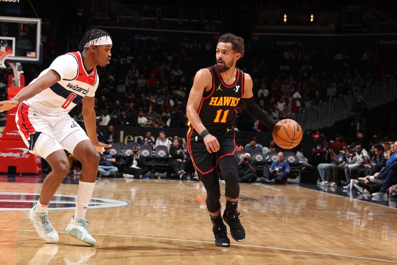 WASHINGTON, DC -? OCTOBER 30: Trae Young #11 of the Atlanta Hawks dribbles the ball during the game against the Washington Wizards on October 30, 2024 at Capital One Arena in Washington, DC. NOTE TO USER: User expressly acknowledges and agrees that, by downloading and or using this Photograph, user is consenting to the terms and conditions of the Getty Images License Agreement. Mandatory Copyright Notice: Copyright 2024 NBAE (Photo by Stephen Gosling/NBAE via Getty Images)