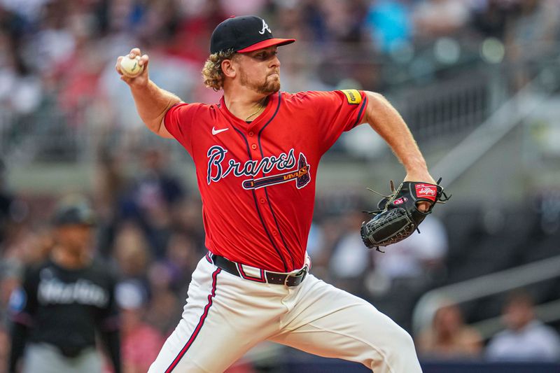 Aug 2, 2024; Cumberland, Georgia, USA; Atlanta Braves starting pitcher Spencer Schwellenbach (56) pitches against the Miami Marlins during the third inning at Truist Park. Mandatory Credit: Dale Zanine-USA TODAY Sports