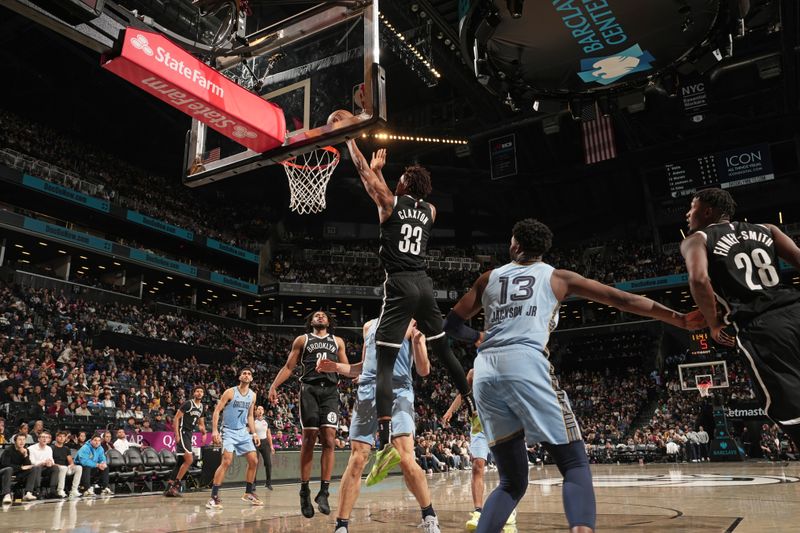 BROOKLYN, NY - NOVEMBER 4: Nicolas Claxton #33 of the Brooklyn Nets drives to the basket during the game against the Memphis Grizzlies on November 4, 2024 at Barclays Center in Brooklyn, New York. NOTE TO USER: User expressly acknowledges and agrees that, by downloading and or using this Photograph, user is consenting to the terms and conditions of the Getty Images License Agreement. Mandatory Copyright Notice: Copyright 2024 NBAE (Photo by Jesse D. Garrabrant/NBAE via Getty Images)