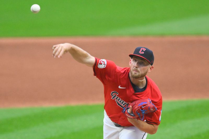 May 3, 2024; Cleveland, Ohio, USA; Cleveland Guardians starting pitcher Tanner Bibee (28) delivers a pitch in the first inning against the Los Angeles Angels at Progressive Field. Mandatory Credit: David Richard-USA TODAY Sports