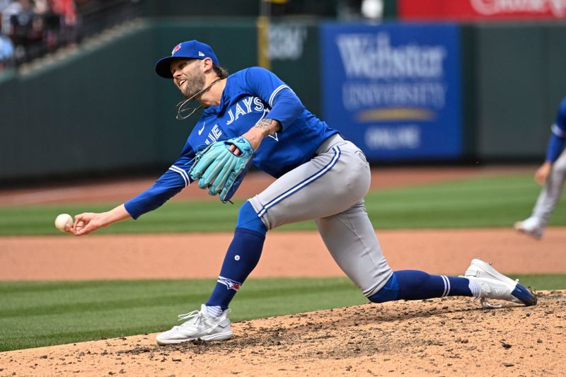 Apr 1, 2023; St. Louis, Missouri, USA; Toronto Blue Jays relief pitcher Adam Cimber (90) pitches against the St. Louis Cardinals in the seventh inning at Busch Stadium. Mandatory Credit: Joe Puetz-USA TODAY Sports