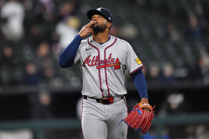 Apr 2, 2024; Chicago, Illinois, USA; Atlanta Braves starting pitcher Reynaldo Lopez (40) celebrates after ending the fourth inning against the Chicago White Sox at Guaranteed Rate Field. Mandatory Credit: Patrick Gorski-USA TODAY Sports