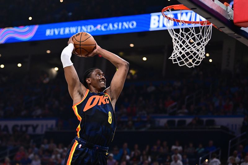 OKLAHOMA CITY, OKLAHOMA - APRIL 14: Jalen Williams #8 of the Oklahoma City Thunder goes up for a dunk during the first half against the Dallas Mavericks at Paycom Center on April 14, 2024 in Oklahoma City, Oklahoma. NOTE TO USER: User expressly acknowledges and agrees that, by downloading and or using this Photograph, user is consenting to the terms and conditions of the Getty Images License Agreement. (Photo by Joshua Gateley/Getty Images)