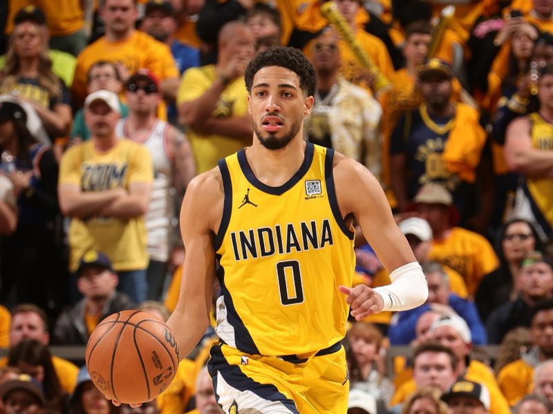 INDIANAPOLIS, IN - MAY 25:  Tyrese Haliburton #0 of the Indiana Pacers dribbles the ball during the game against the New York Knicks  during Game 3 of the 2025 Eastern Conference Finals on May 25, 2025 at Gainbridge Fieldhouse in Indianapolis, Indiana. NOTE TO USER: User expressly acknowledges and agrees that, by downloading and or using this Photograph, user is consenting to the terms and conditions of the Getty Images License Agreement. Mandatory Copyright Notice: Copyright 2025 NBAE (Photo by Nathaniel S. Butler/NBAE via Getty Images)