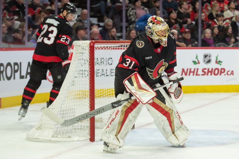 Nov 24, 2023; Ottawa, Ontario, CAN; New York Islanders POS PLAYER (##) ACTION against Ottawa Senators POS PLAYER (##) in the second period at the Canadian Tire Centre. Mandatory Credit: Marc DesRosiers-USA TODAY Sports