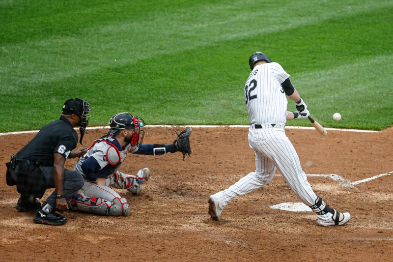 Jun 8, 2024; Chicago, Illinois, USA; Chicago White Sox outfielder Gavin Sheets (32) hits a grand slam against the Boston Red Sox during the fifth inning at Guaranteed Rate Field. Mandatory Credit: Kamil Krzaczynski-USA TODAY Sports