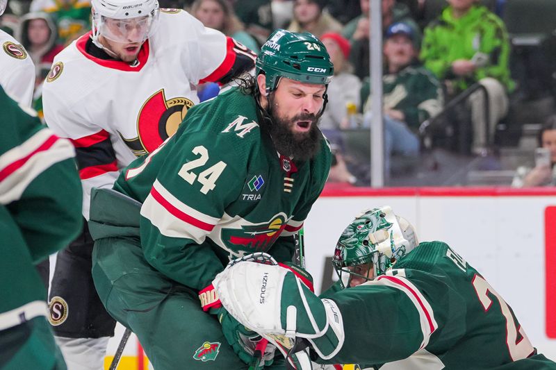 Apr 2, 2024; Saint Paul, Minnesota, USA; Minnesota Wild defenseman Zach Bogosian (24) blocks a shot against the Ottawa Senators in the third period at Xcel Energy Center. Mandatory Credit: Brad Rempel-USA TODAY Sports