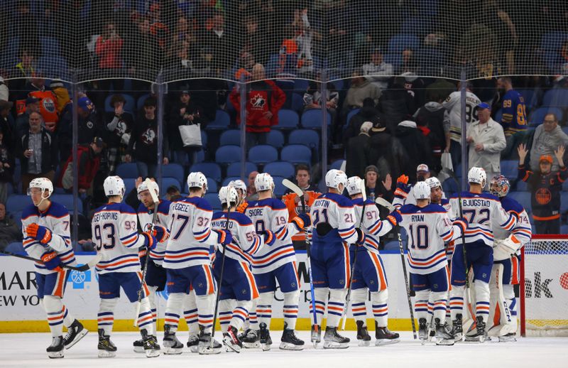 Mar 6, 2023; Buffalo, New York, USA;  The Edmonton Oilers celebrate a win over the Buffalo Sabres at KeyBank Center. Mandatory Credit: Timothy T. Ludwig-USA TODAY Sports