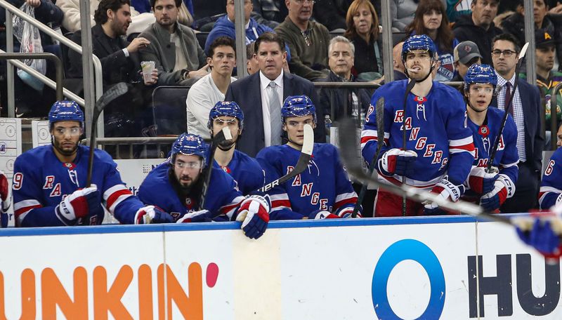 Jan 18, 2025; New York, New York, USA; New York Rangers head coach Peter Laviolette watches from the bench during the second period against the Columbus Blue Jackets at Madison Square Garden. Mandatory Credit: Danny Wild-Imagn Images