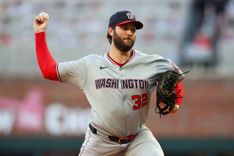 May 30, 2024; Atlanta, Georgia, USA; Washington Nationals starting pitcher Trevor Williams (32) throws against the Atlanta Braves in the third inning at Truist Park. Mandatory Credit: Brett Davis-USA TODAY Sports