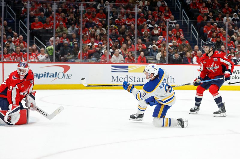 Dec 14, 2024; Washington, District of Columbia, USA; Washington Capitals goaltender Logan Thompson (48) makes a save on Buffalo Sabres left wing Zach Benson (9) in the second period at Capital One Arena. Mandatory Credit: Geoff Burke-Imagn Images