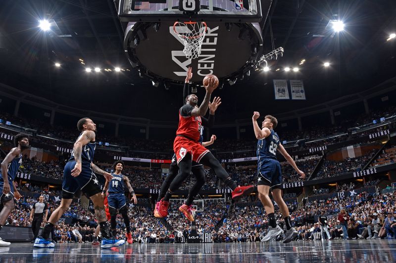 ORLANDO, FL - FEBRUARY 10: Andre Drummond #3 of the Chicago Bulls shoots the ball during the game against the Orlando Magic on February 10, 2024 at the Kia Center in Orlando, Florida. NOTE TO USER: User expressly acknowledges and agrees that, by downloading and or using this photograph, User is consenting to the terms and conditions of the Getty Images License Agreement. Mandatory Copyright Notice: Copyright 2024 NBAE (Photo by Fernando Medina/NBAE via Getty Images)