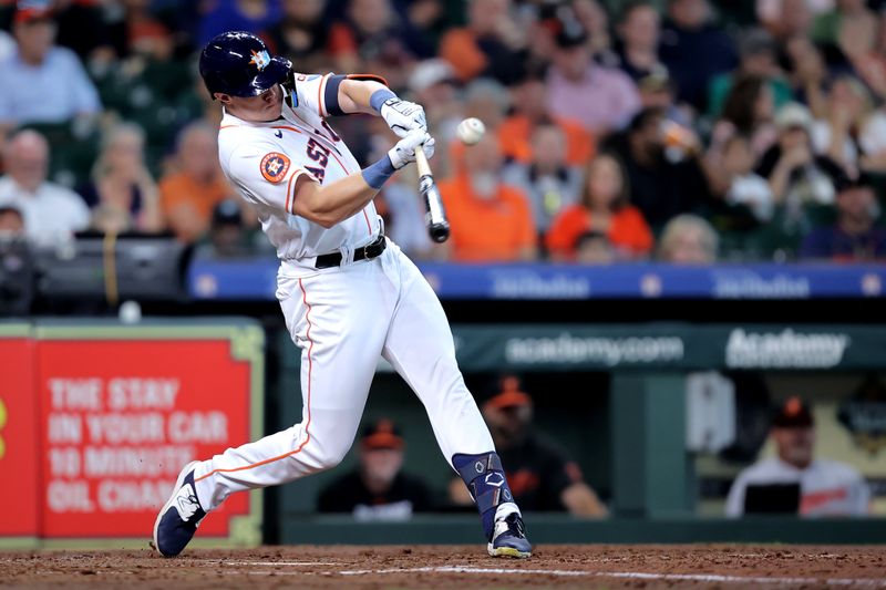 Sep 20, 2023; Houston, Texas, USA; Houston Astros center fielder Jake Meyers (6) hits a single against the Baltimore Orioles during the sixth inning at Minute Maid Park. Mandatory Credit: Erik Williams-USA TODAY Sports