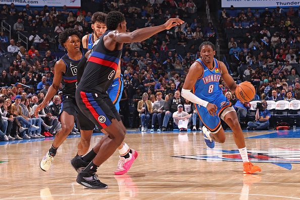 OKLAHOMA CITY, OK - OCTOBER 30:  Olivier Sarr #30 of the Oklahoma City Thunder dribbles the ball during the game against the Detroit Pistons on October 30, 2023 at Paycom Arena in Oklahoma City, Oklahoma. NOTE TO USER: User expressly acknowledges and agrees that, by downloading and or using this photograph, User is consenting to the terms and conditions of the Getty Images License Agreement. Mandatory Copyright Notice: Copyright 2023 NBAE (Photo by Zach Beeker/NBAE via Getty Images)