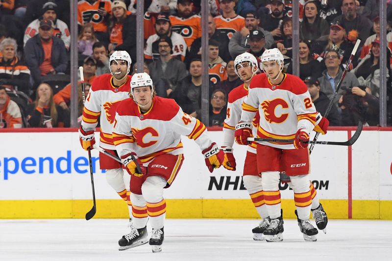 Mar 4, 2025; Philadelphia, Pennsylvania, USA; Calgary Flames center Connor Zary (47) skates back to the bench after scoring a goal against the Philadelphia Flyers during the first period at Wells Fargo Center. Mandatory Credit: Eric Hartline-Imagn Images