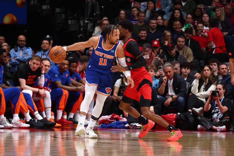 TORONTO, CANADA - MARCH 27: Jalen Brunson #11 of the New York Knicks dribbles the ball during the game against the Toronto Raptors on March 27, 2024 at the Scotiabank Arena in Toronto, Ontario, Canada.  NOTE TO USER: User expressly acknowledges and agrees that, by downloading and or using this Photograph, user is consenting to the terms and conditions of the Getty Images License Agreement.  Mandatory Copyright Notice: Copyright 2024 NBAE (Photo by Vaughn Ridley/NBAE via Getty Images)