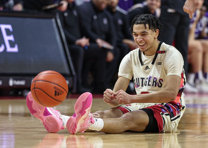 Feb 15, 2024; Piscataway, New Jersey, USA; Rutgers Scarlet Knights guard Derek Simpson (0) reacts during the second half against the Northwestern Wildcats at Jersey Mike's Arena. Mandatory Credit: Vincent Carchietta-USA TODAY Sports