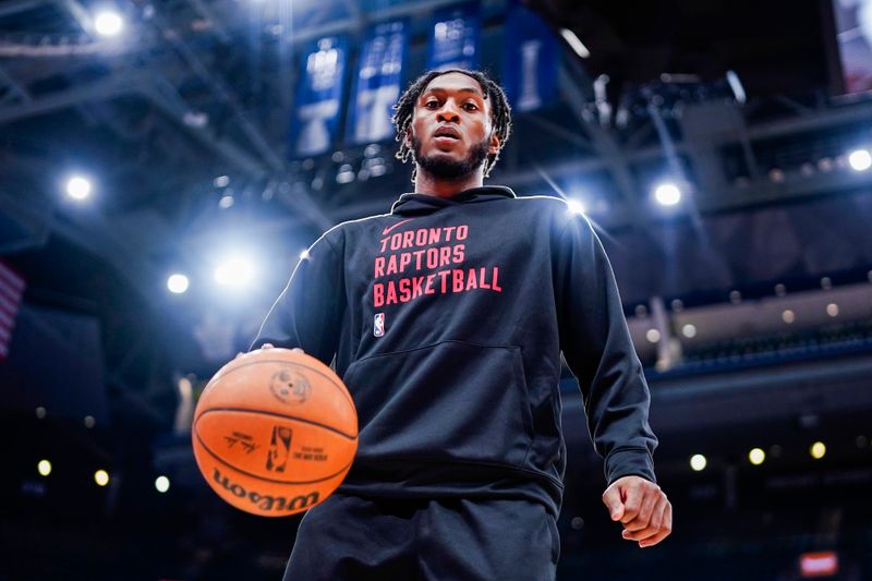 TORONTO, CANADA - FEBRUARY 14: Immanuel Quickley #5 of the Toronto Raptors looks on before the game against the Indiana Pacers on February 14, 2024 at the Scotiabank Arena in Toronto, Ontario, Canada.  NOTE TO USER: User expressly acknowledges and agrees that, by downloading and or using this Photograph, user is consenting to the terms and conditions of the Getty Images License Agreement.  Mandatory Copyright Notice: Copyright 2024 NBAE (Photo by Mark Blinch/NBAE via Getty Images)