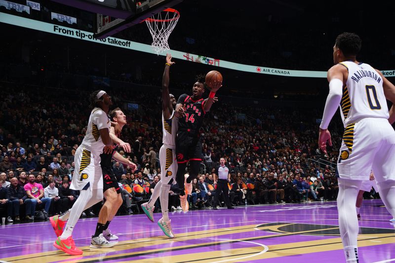 TORONTO, CANADA - DECEMBER 3: Ja'Kobe Walter #14 of the Toronto Raptors drives to the basket during the game against the Indiana Pacers during the Emirates NBA Cup game on December 3, 2024 at the Scotiabank Arena in Toronto, Ontario, Canada.  NOTE TO USER: User expressly acknowledges and agrees that, by downloading and or using this Photograph, user is consenting to the terms and conditions of the Getty Images License Agreement.  Mandatory Copyright Notice: Copyright 2024 NBAE (Photo by Mark Blinch/NBAE via Getty Images)