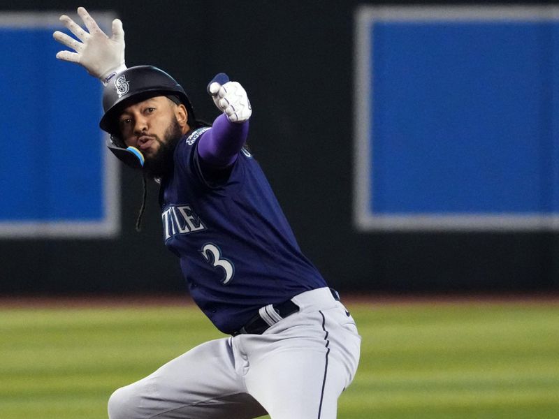 Jul 28, 2023; Phoenix, Arizona, USA; Seattle Mariners shortstop J.P. Crawford (3) celebrates a double against the Arizona Diamondbacks during the first inning at Chase Field. Mandatory Credit: Joe Camporeale-USA TODAY Sports