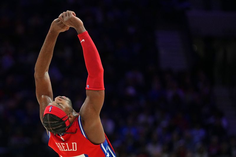 PHILADELPHIA, PENNSYLVANIA - FEBRUARY 09: Buddy Hield #17 of the Philadelphia 76ers reacts during the game against the Atlanta Hawks in the second half at the Wells Fargo Center on February 9, 2024 in Philadelphia, Pennsylvania. The Hawks defeated the 76ers 127-121. NOTE TO USER: User expressly acknowledges and agrees that, by downloading and or using this photograph, User is consenting to the terms and conditions of the Getty Images License Agreement. (Photo by Mitchell Leff/Getty Images)